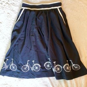 Anthropologie Navy a-line skirt with embroidery